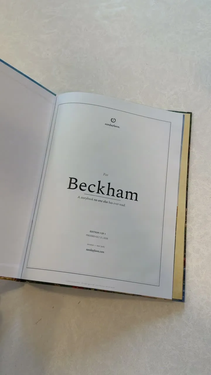 A child reading her personalized Sundayfawn hardcover at bedtime